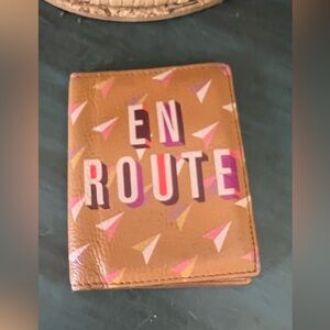 Fossil Travel RFID Passport Case in tan leather featuring a multi-color